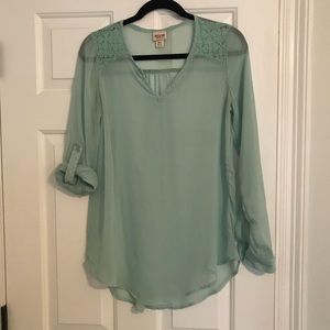 Sheer top.  Mint color.  Size medium.